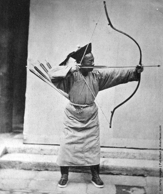 a manchu soldier with his bow and arrow.  1871.jpg